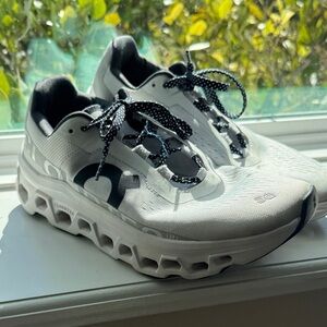On Running Cloudmonster White and Black Athletic Shoes